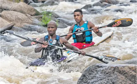  ?? ?? The pair of Euro Steel's Thabani Msia (front) and Team MyLife's Msawenkosi Mtolo (back) powered their way to an unpreceden­ted third straight Gresham Wealth Non-Stop Dusi Canoe Marathon title on Friday. Anthony Grote/Gameplan Media