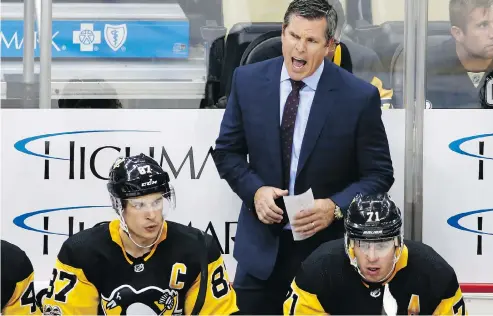  ?? GENE J. PUSKAR / THE ASSOCIATED PRESS FILES ?? Mike Sullivan is “one of the top coaches in the league,” Pittsburgh Penguins GM Jim Rutherford says, adding: “I like the continuity.”