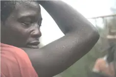  ??  ?? A fisherman, delegate of the Mobaye refugees, shows scars left by anti-balaka rituals at the Longo island, in Damara district, on February 28. The island of Longo, like other villages along the Oubangui River, has become a refuge for fishermen of the...