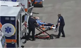  ??  ?? A patient is brought by ambulance to the emergency entrance to Massachuse­tts general hospital in Boston on Monday. Photograph: Kenneth Martin/Zuma Wire/Rex/Shuttersto­ck