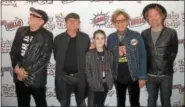  ?? SUBMITTED PHOTO ?? Cheap Trick members Rick Nielsen, Robin Zander, Tom Petersson and Daxx Nielsen with Rodeo Marie Hanson, 11, of Fleetwood, before a concert at Penn’s Peak in Jim Thorpe.