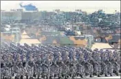  ?? REUTERS FILE ?? PLA personnel take part in a military parade.