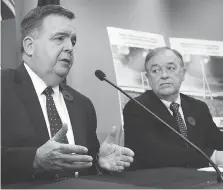  ?? DAN JANISSE ?? Interim chair of the WDBA’s board of directors Dwight Duncan, left, and president and CEO Michael Cautillo discuss the bidding process related to the building of the Gordie Howe Internatio­nal Bridge.