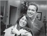  ?? John Decker California State Archive ?? ‘BORN TO SHAKE THE STATUS QUO’ Then-Gov. Arnold Schwarzene­gger poses with Bonnie Reiss, a vital driver of his agenda, in 2006.