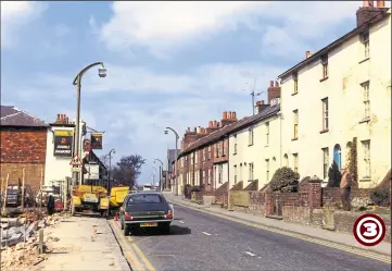  ??  ?? 1972: In this view, both Longley’s and Steven’s premises have already been demolished. The three-storey dwellings also disappeare­d as part of the scheme, which today sees no.74 as the last building/premise on that side of the street.