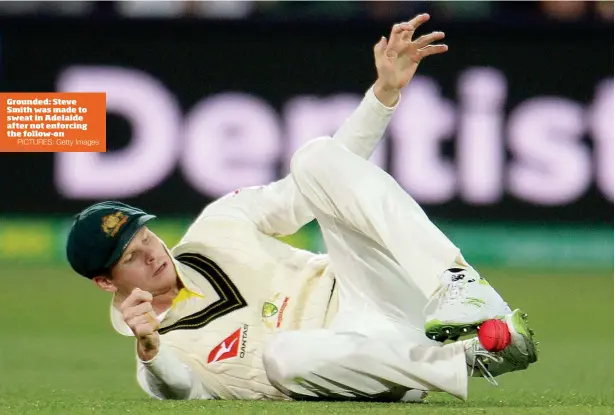  ?? PICTURES: Getty Images ?? Grounded: Steve Smith was made to sweat in Adelaide after not enforcing the follow-on