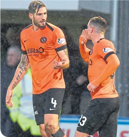  ??  ?? Frederic Frans (left) celebrates his opening goal at Cappielow