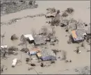  ?? The Associated Press ?? An aerial shot of some of Thursday’s destructio­n in Louisiana.