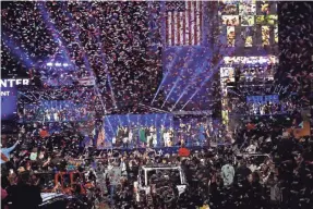  ??  ?? Confetti flies after Biden delivered his victory address on Saturday. “The people of this nation have spoken,” Biden said. “They’ve delivered a clear victory.”