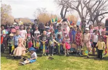  ?? COURTESY OF CCFNM ?? Young cancer patients and their families pose for a picture during the Children’s Cancer Fund of New Mexico’s 2018 Easter Egg Hunt in Albuquerqu­e’s North Valley. CCFNM, a nonprofit organizati­on, depends on grants and donations to carry out its mission of helping children and their families deal with the challenges of battling cancer.