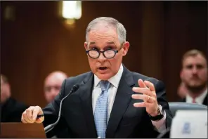  ?? AP/ANDREW HARNIK ?? Environmen­tal Protection Agency Administra­tor Scott Pruitt testifies on Capitol Hill in Washington in May. EPA emails show Pruitt’s top aides were directed to review public records releases under the Freedom of Informatio­n Act.