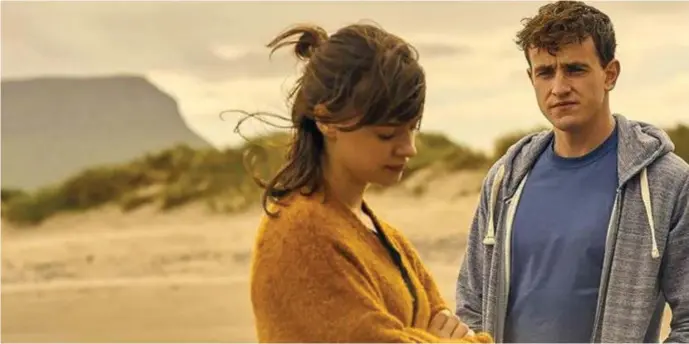  ??  ?? Connell (Paul Mescal) and Marianne (Daisy Edgar Jones) the stars of Normal People pictured during filming at Streedagh beach, Sligo.