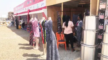  ??  ?? Traders open stand during the opening ceremony of the 15th Abuja Internatio­nal Trade Fair organised by the Abuja Chamber of Commerce and Industry (ACCI)