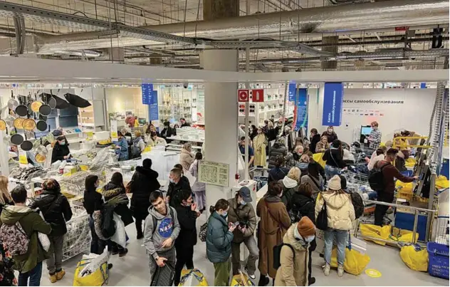  ?? Reuters ?? Customers form a queue at an IKEA store in Moscow.