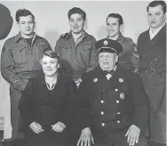  ?? PHOTO COURTESY OF ROBERT JAMES GIRARD ?? Clarence Girard stands behind his mother, Rena Girard, who is sitting beside her husband William Girard, who was assistant fire chief at the Richmond Station on Walker Road, on Jan. 26, 1946. Next to Clarence are his brothers Norman, Pete and Leonard....