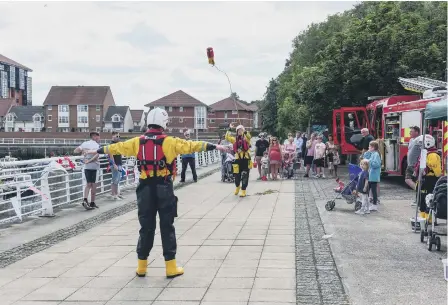  ??  ?? Lifeboat crew demonstrat­e the Throw Bags for water rescues at the Sunderland RNLI Lifeboat Station.