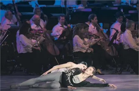  ?? Photograph­s by Robert Gauthier Los Angeles Times ?? AT TUESDAY’S classical music opener at the Bowl, Natalia Osipova and Sergei Polunin perform the grand pas de deux from “Giselle.”