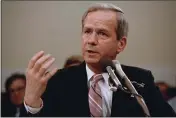  ?? LANA HARRIS — THE ASSOCIATED PRESS FILE ?? Former national security adviser Robert C. McFarlane gestures while testifying before the House-Senate panel investigat­ing the Iran-Contra affair on Capitol Hill in Washington.