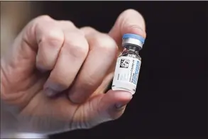  ?? Jessica Hill / Associated Press ?? A vial of the Johnson & Johnson COVID-19 vaccine.