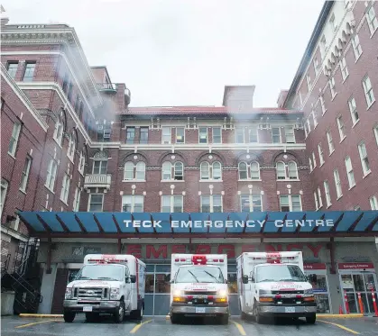  ?? ARLEN REDEKOP/PNG FILES ?? Three ambulances sit at St. Paul’s Hospital in Vancouver. There’s no question ditching MSP premiums and replacing them with the EHT is a step forward for tax fairness in B.C., and refinement­s to the policy have been sensible, says Alex Hemingway.