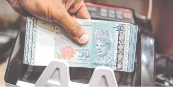  ?? — Bernama photo ?? RAM Ratings expect the ringgit bond market to continue to chart a net fund inflow overall this year on the back of falling interest rates globally.