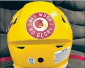  ?? Luca Evans For The Times ?? ROOSEVELT HIGH’S helmets honor the memory of assistant coach Richard Guillen, who died of COVID.