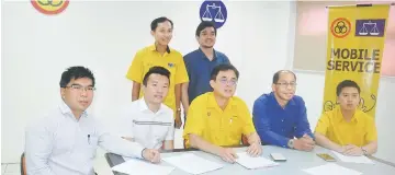  ??  ?? Tan (seated centre) in a photo-call with (seated, from left) Pau, Lai, Mok and Li during the press conference. Also seen are (standing, from left) Yek and Chai.