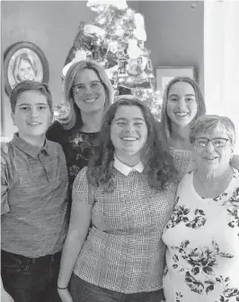  ??  ?? Claudette Cramm, right, stands with her daughter Kimberley Studer and her grandchild­ren Séamus and Deirdre, back, and Aisling, front.