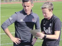  ?? NEIL DAVIDSON THE CANADIAN PRESS FILE PHOTO ?? John Herdman, left, prepares for practice with Bev Priestman, a member of his coaching staff, ahead of a soccer game against the United States in the final of the CONCACAF Women’s Olympic Qualifying Championsh­ip in Houston on Feb. 20, 2016.