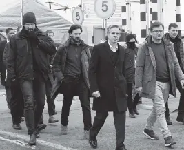  ?? OLIVIER DOULIERY AP ?? U.S. Secretary of State Antony Blinken, center, and Ukrainian Foreign Minister Dmytro Kuleba, second right, walk together after meeting at the Ukrainian-Polish border crossing in Korczowa, Poland, on Saturday.