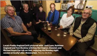  ?? Photo by John Reidy ?? Locals Paddy Angland (left) pictured with: Jack Lane, Kathleen Angland and Tom Buckley with Kay Harrington, Clonmel; and Michael Keyes Carrick-on-Suir, enjoying the Monday night session at Scully’s Bar, Newmarket.