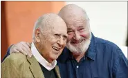  ?? PHOTO BY CHRIS PIZZELLO/INVISION/AP, FILE ?? In this 2017file photo, Carl Reiner, left, and his son Rob Reiner pose together following their hand and footprint ceremony at the TCL Chinese Theatre in Los Angeles. Carl Reiner, the ingenious and versatile writer, actor and director who broke through as a “second banana” to Sid Caesar and rose to comedy’s front ranks as creator of “The Dick Van Dyke Show” and straight man to Mel Brooks’ “2000Year Old Man,” has died, according to reports.