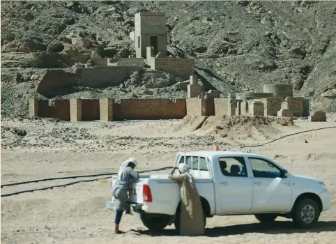  ?? (Amr Abdallah Dalsh/Reuters) ?? ALEXANDER NUBIA staff are pictured at Abu Zawal, an abandoned 20th-century British mine, in the Eastern Desert near the southern province of Luxor last month. Egypt’s gold-mining industry has for years been long on potential and short on investment –...