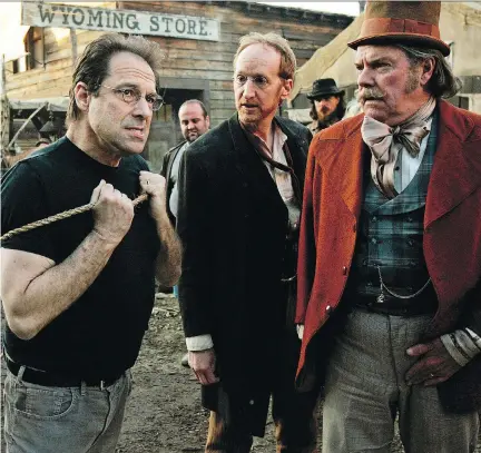  ?? KEVORK DJANSEZIAN/THE ASSOCIATED PRESS ?? Deadwood — which was created by David Milch, left, and starred Larry Cedar and Peter Jason — is coming back as a movie. The award-winning HBO series was a critical hit and production on the movie is scheduled to begin later this year.