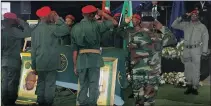  ??  ?? Soldiers of the PAC’s military wing salute the life of Philip Kgosana in Pretoria yesterday.