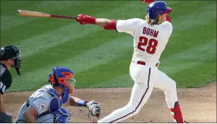  ?? LAURENCE KESTERSON — THE ASSOCIATED PRESS ?? Alec Bohm follows through on a home run during the Phillies’ four-run first inning against the Mets on Wednesday.