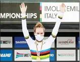  ??  ?? The Netherland­s’ Anna Van der Breggen celebrates on the podium after winning the women’s Individual Time Trial event at the road cycling World Championsh­ips in
Imola, Italy on Sept 24. (AP)