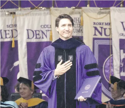  ?? — GETTY IMAGES ?? Prime Minister Justin Trudeau acknowledg­es the crowd after receiving an honorary doctor of laws degree at New York University’s commenceme­nt ceremony on Wednesday.