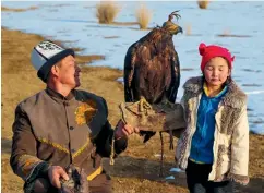  ??  ?? Eagle hunting is an age-old Kyrgyz tradition.