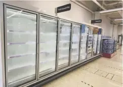  ??  ?? 0 Fruit and pastries freezers empty at Sainsbury’s in Edinburgh