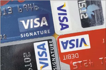  ?? THE ASSOCIATED PRESS ?? Payment processing giant Visa’s new platform for banks, which uses biometrics including facial recognitio­n, could lead to customers having to take a selfie to verify they actually made an online purchase or applied for a particular credit card.