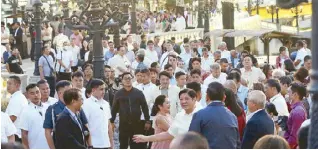  ?? ?? The President and First Lady walk the esplanade with over 200 select guests.