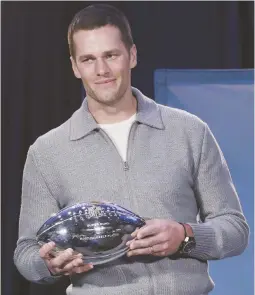  ?? - Archives ?? Tom Brady a remporté son premier titre de Joueur le plus utile de la NFL en 2007 (ci-dessus). Depuis, il en a ajouté deux autre à son palmarès, dont l’an dernier, à l’âge de 40 ans.