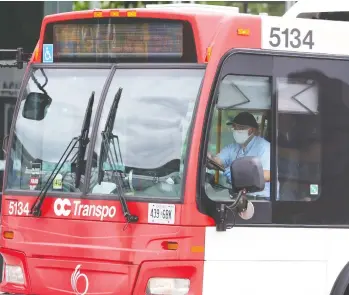  ?? JEAN LEVAC / POSTMEDIA NEWS ?? Passengers and OC Transpo staff will have to wear a mask from June 15 in order to use public transit in Ottawa.