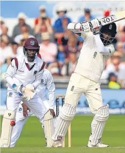 ?? Picture: PA. ?? Moeen Ali hits out as his quickfire 84 helped England to build a lead of 316 runs over West Indies.