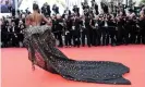  ??  ?? The back of Leomie Anderson’s dress. Photograph: Stephane Cardinale/Corbis via Getty Images