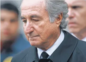  ?? 2014 PHOTO BY MARIO TAMA, GETTY IMAGES ?? Bernard Madoff is serving 150 years in prison for running a massive Ponzi scheme.