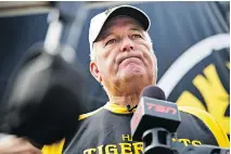  ?? AARON LYNETT/THE CANADIAN PRESS ?? Hamilton Tiger-Cats head coach June Jones speaks to reporters after a practice in Hamilton on Tuesday. Jones called the team’s hiring and firing of Art Briles “an emotional thing.”