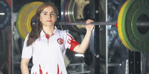  ??  ?? Döndü Yeşilyurt has won titles both in weightlift­ing and judo in only a couple of years after she took up both sports.