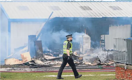  ?? Pictures: Steve Macdougall. ?? The site at Perth Airport, Scone, is now a crime scene.